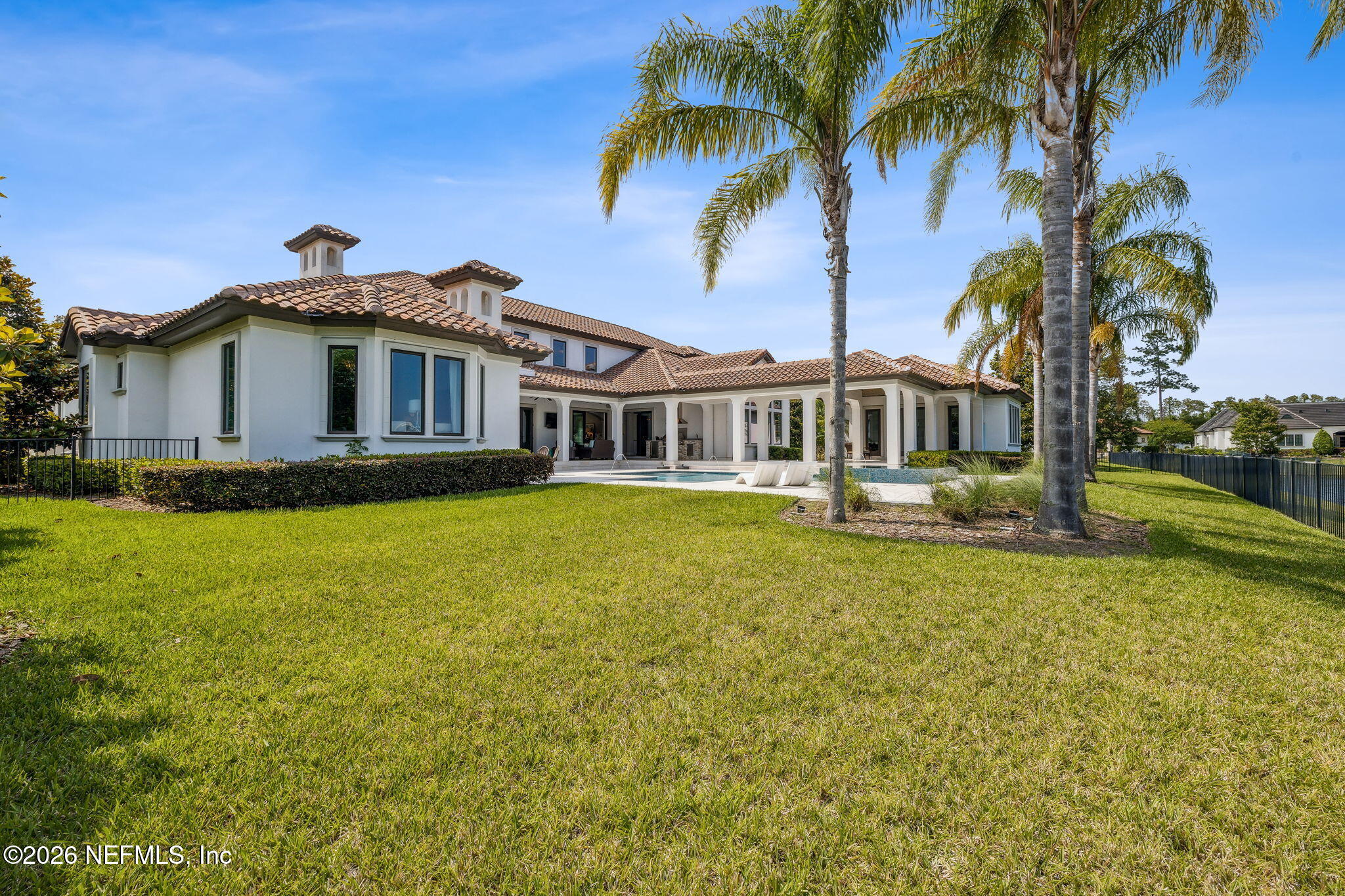 5275 Bentpine Cove Road Jacksonville, FL 32224 - Photo 67 of 95 a front view of a house with swimming pool and porch
