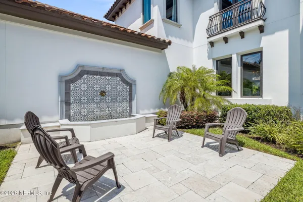 a view of a entryway door with wooden floor