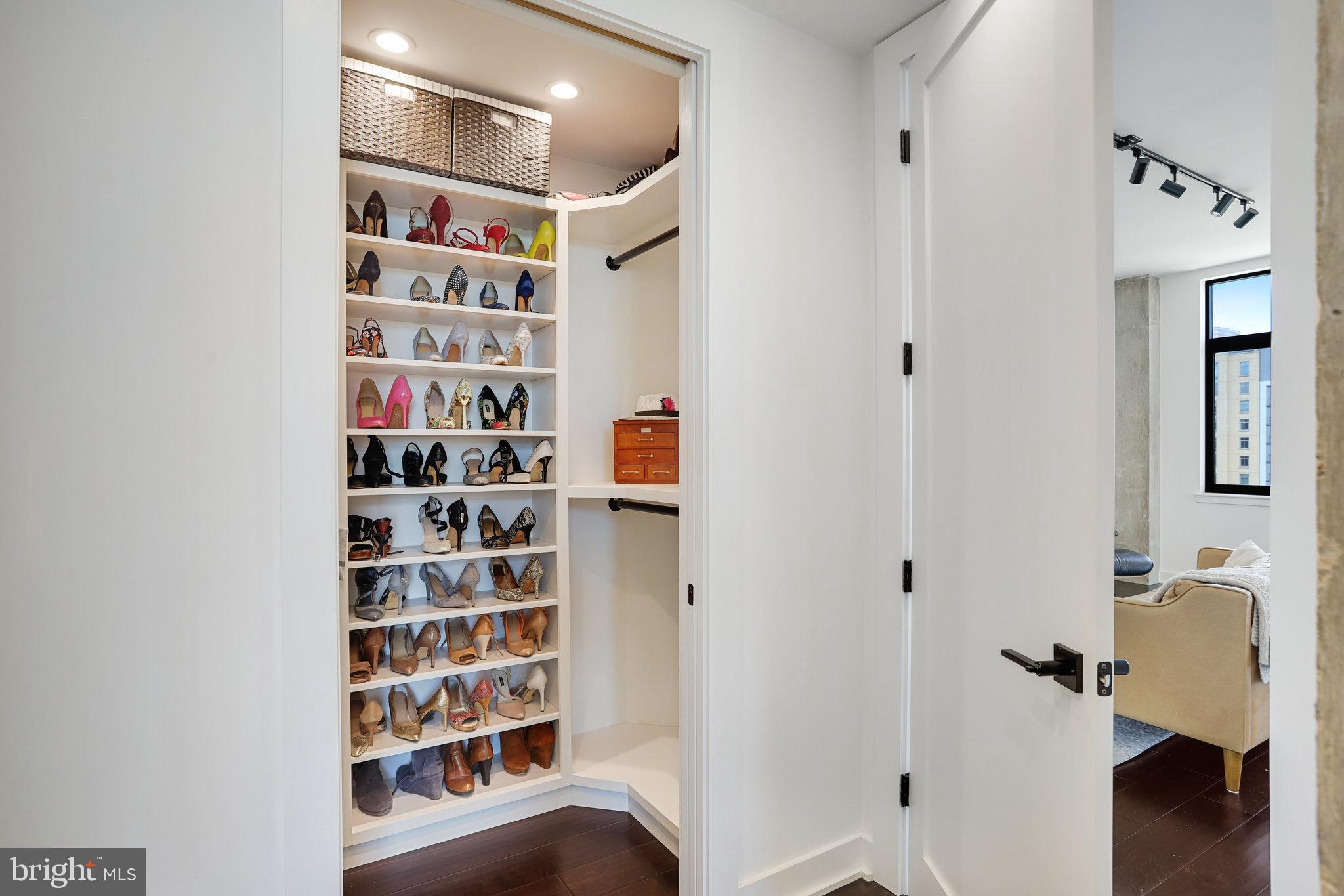 1000 New Jersey Avenue Southeast, Unit 1020 Washington, DC 20003 - Photo 30 of 60 a view of walk in closet with clothes and shoes