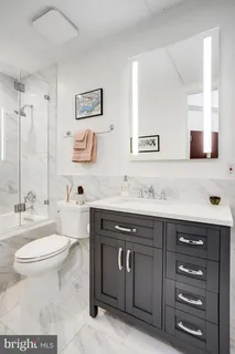 a picture of a bathroom with a window
