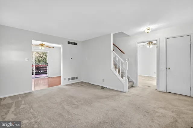 a kitchen with a sink a refrigerator and a sink