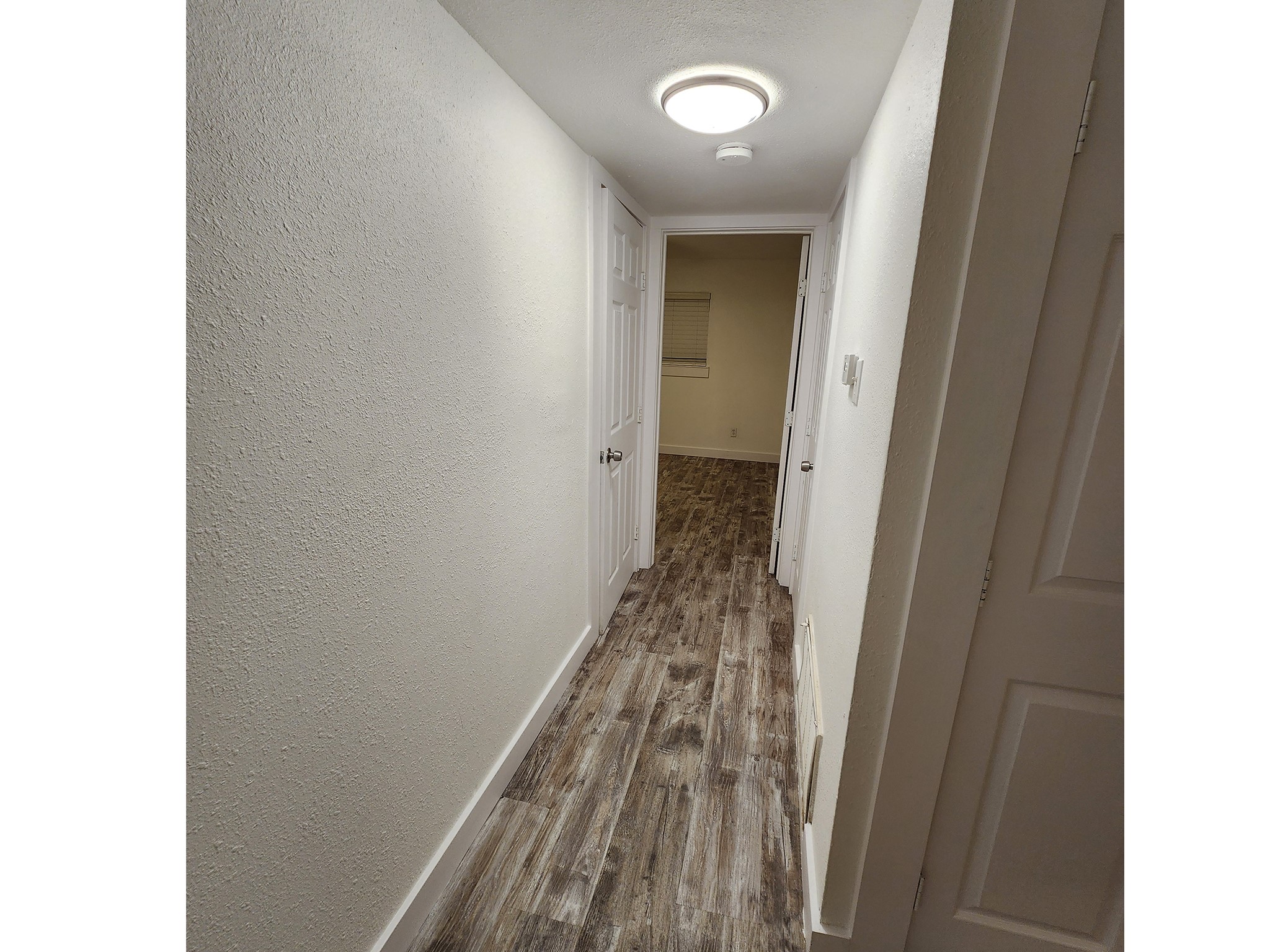 2677 Gessner Road, Unit 203 Houston, TX 77080 - Photo 8 of 11 a view of a hallway