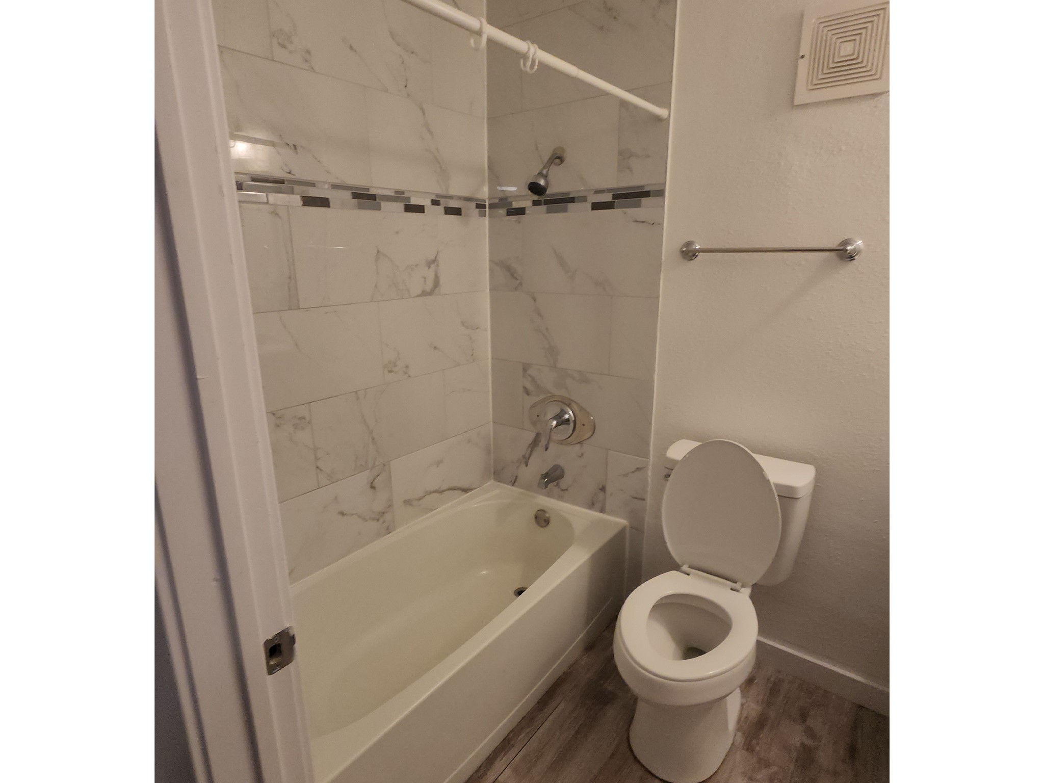 2677 Gessner Road, Unit 203 Houston, TX 77080 - Photo 9 of 11 a bathroom with a toilet and a sink