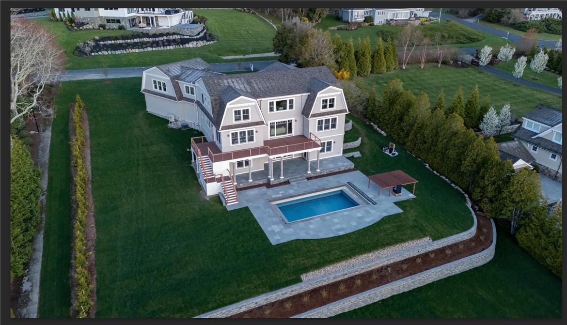 19 Sea Ridge Drive Narragansett, RI 02874 - Photo 2 of 41 Back view, work still needed for some painting, landscaping, pergola, and outdoor grill area.