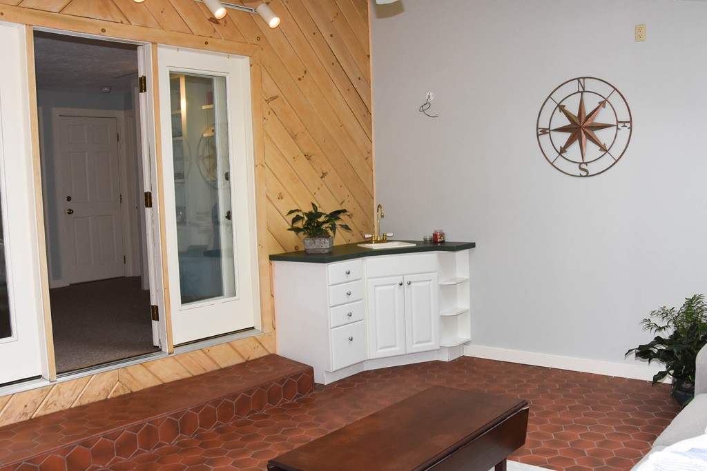 14 Forge Way Duxbury, MA 02332 - Photo 11 of 26 a view of a hallway with wooden floor