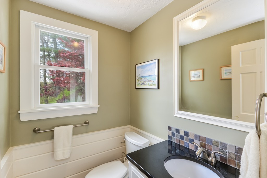 14 Forge Way Duxbury, MA 02332 - Photo 12 of 26 a bathroom with a granite countertop sink mirror and bathtub