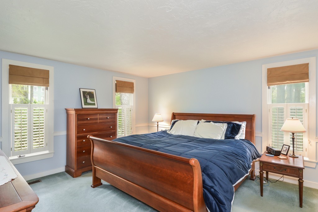 14 Forge Way Duxbury, MA 02332 - Photo 13 of 26 a bedroom with a bed and a window in it