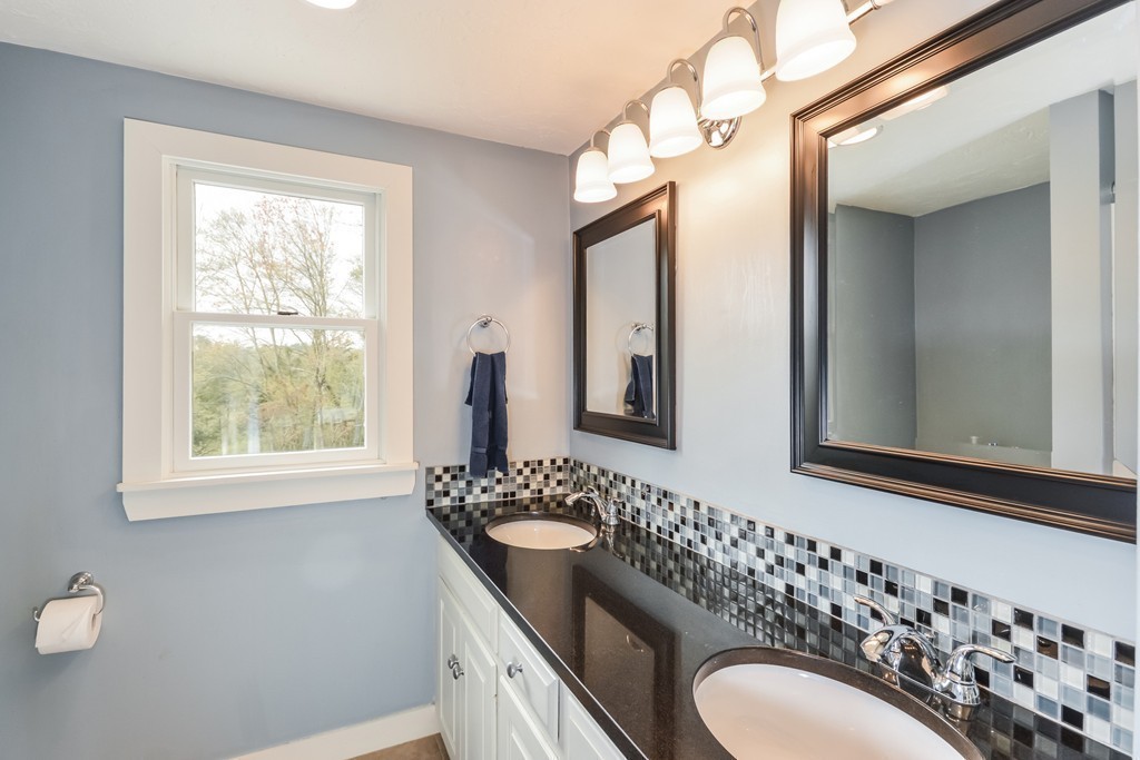 14 Forge Way Duxbury, MA 02332 - Photo 19 of 26 a bathroom with a double vanity sink mirror and double