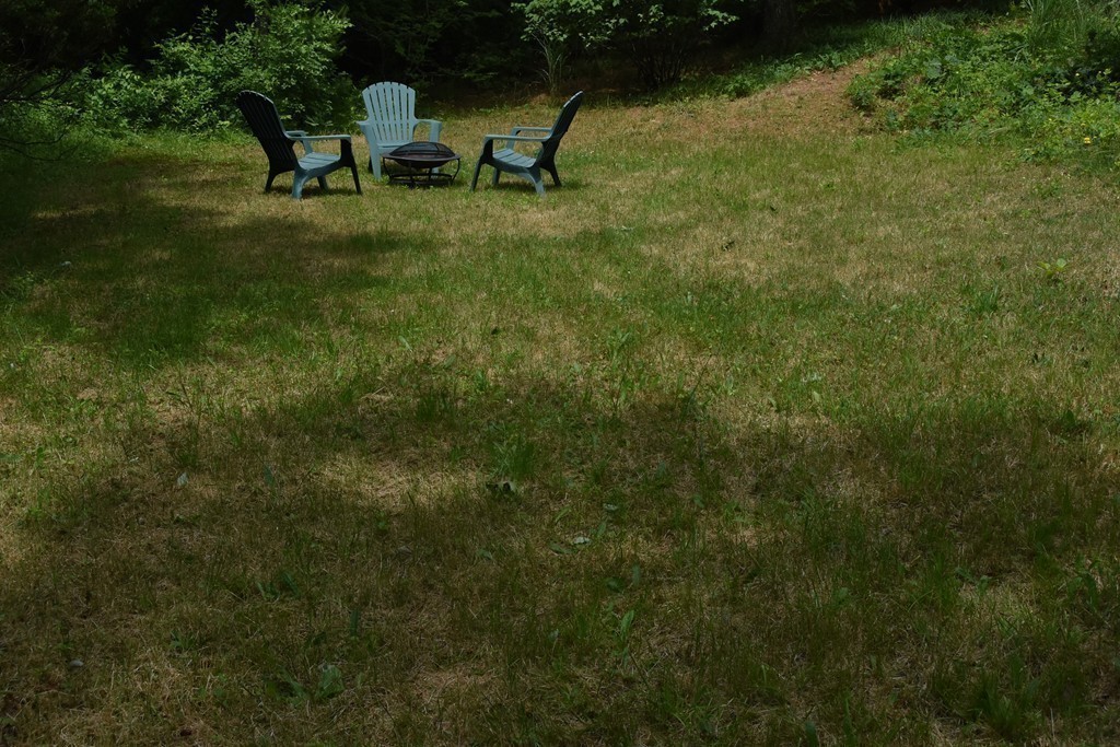14 Forge Way Duxbury, MA 02332 - Photo 20 of 26 a view of a backyard with table and chairs