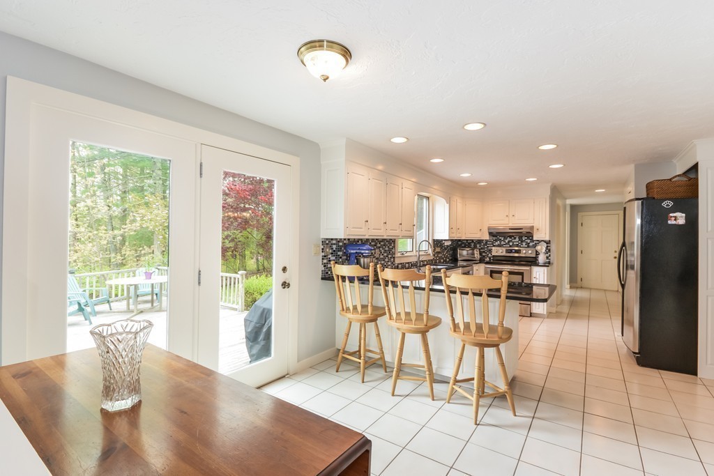 14 Forge Way Duxbury, MA 02332 - Photo 2 of 26 a view of a dining room with furniture