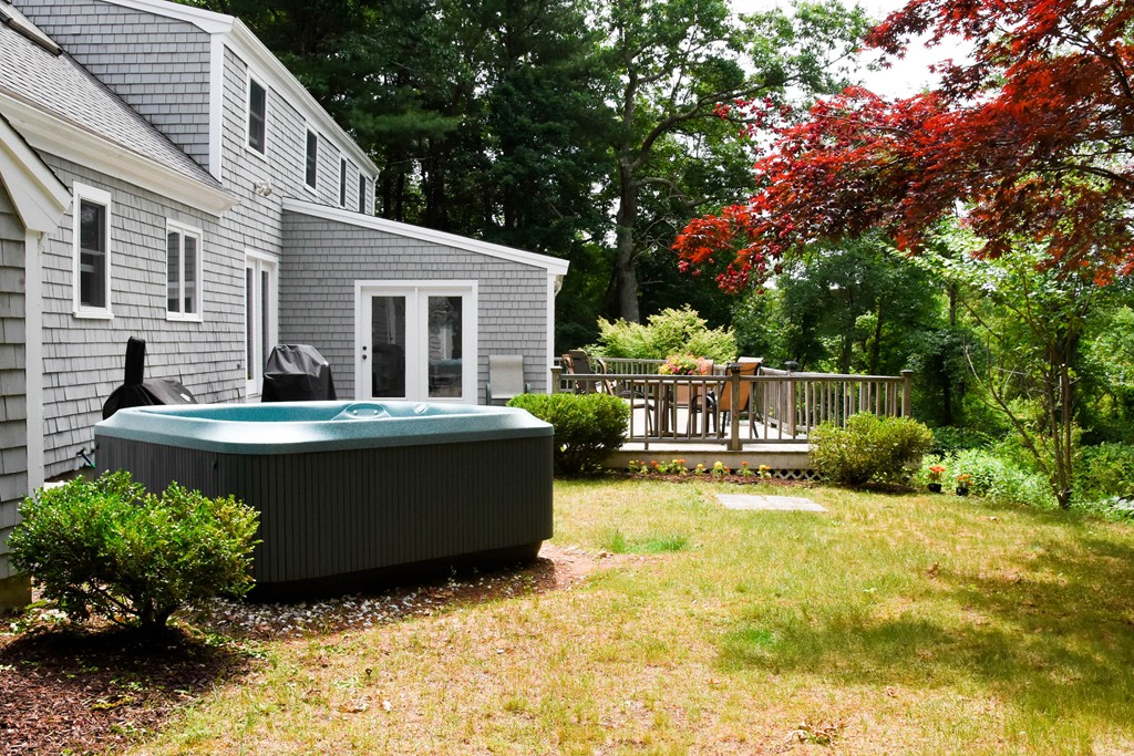 14 Forge Way Duxbury, MA 02332 - Photo 26 of 26 a view of a house with backyard outdoor seating and covered with trees