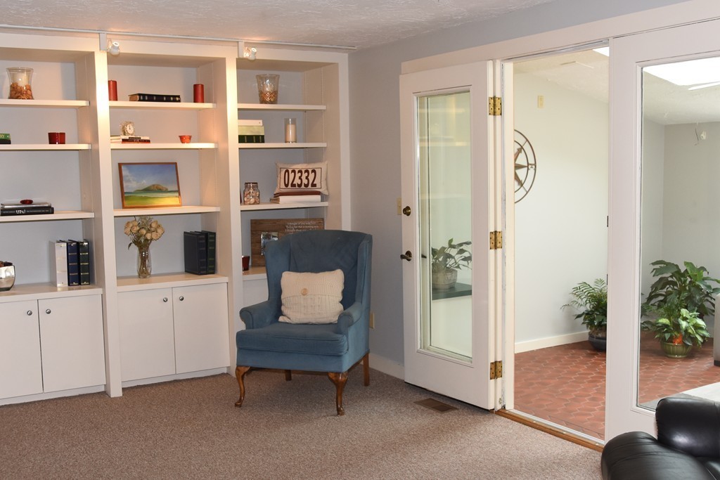 14 Forge Way Duxbury, MA 02332 - Photo 6 of 26 a living room with furniture and a potted plant