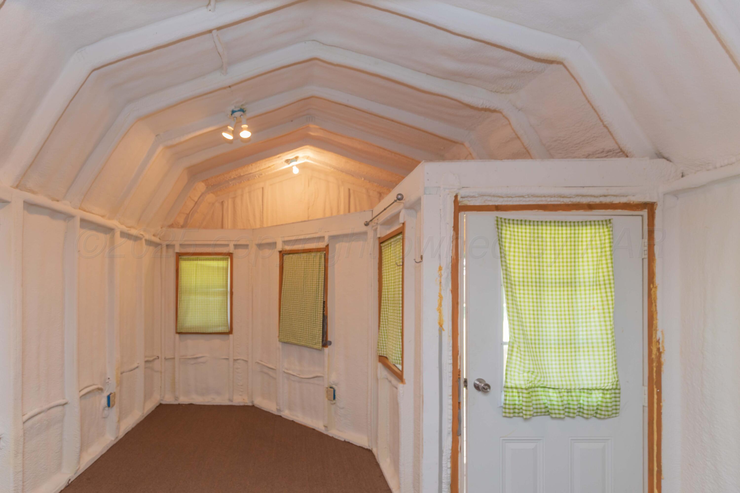 209 East 12th Street Wheeler, TX 79096 - Photo 36 of 40 a bathroom with a sink and shower
