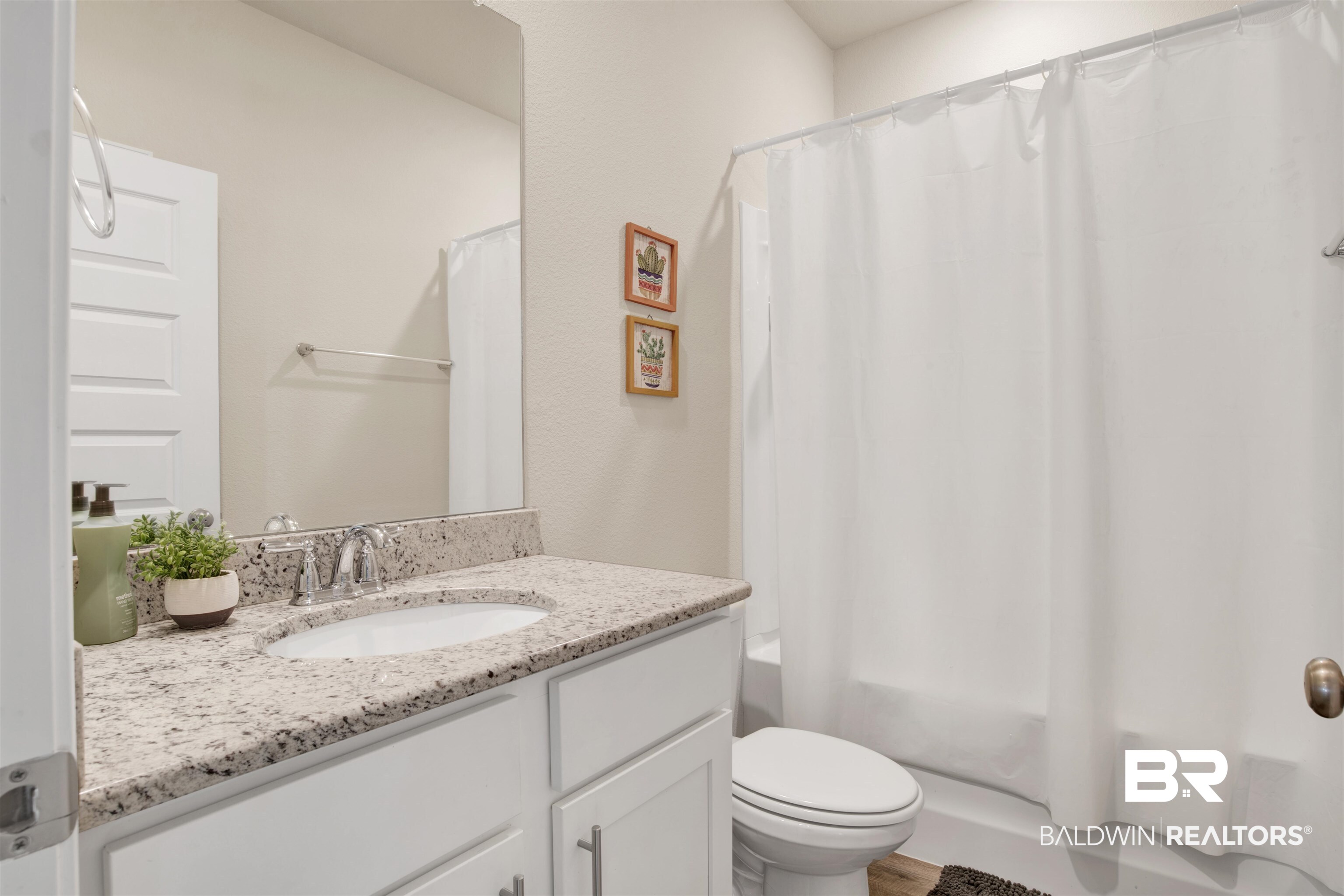 9622 Volterra Avenue Daphne, AL 36526 - Photo 18 of 31 Full bathroom featuring vanity, shower / bath combination with curtain, and toilet
