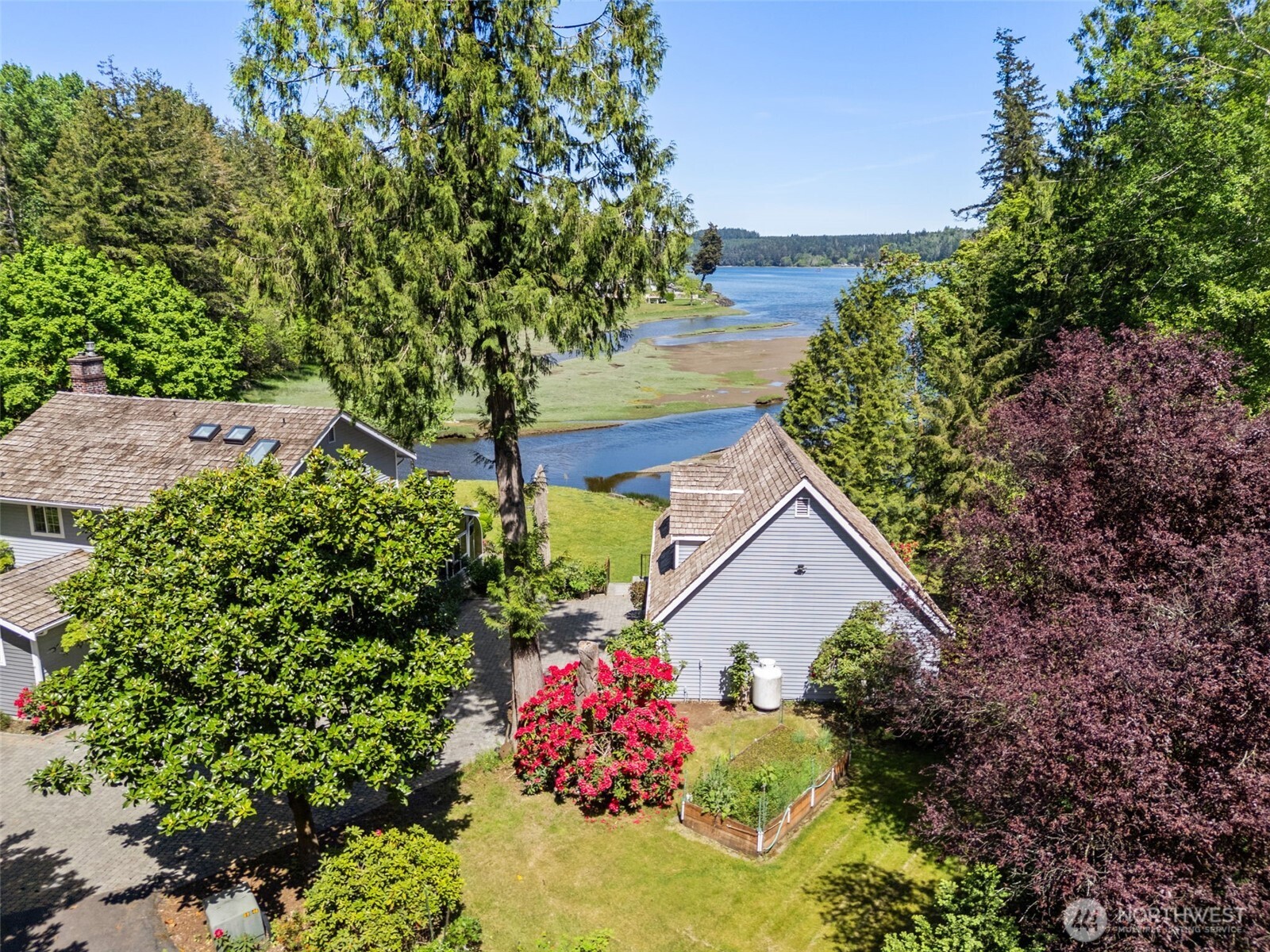 8320 East Grapeview Loop Road Allyn, WA 98524 - Photo 4 of 38 a view of a house