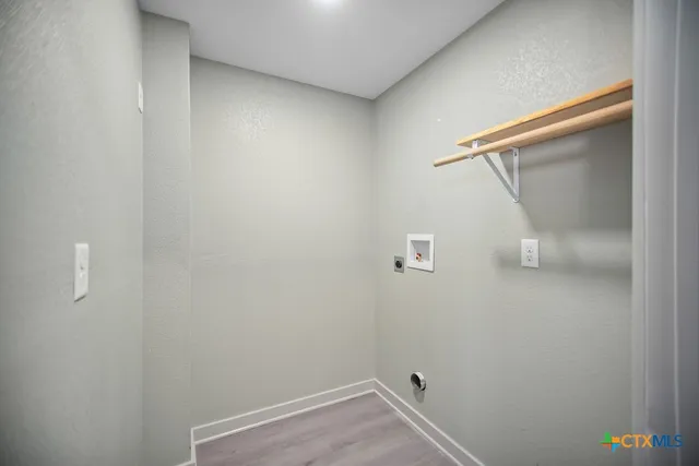 a view of small space with racks on the wall