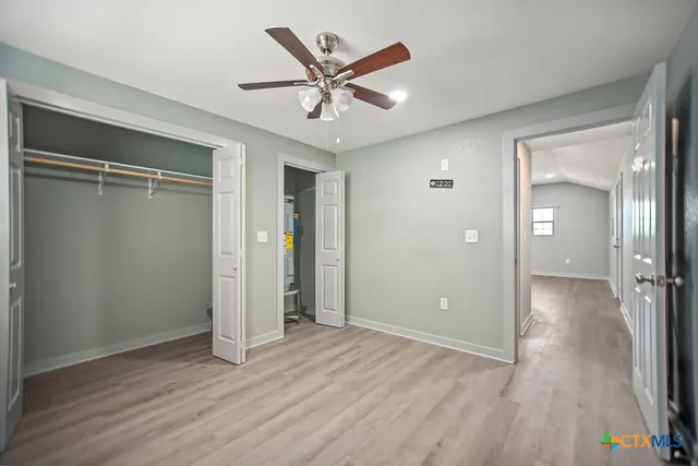 a stove top oven sitting inside of a kitchen