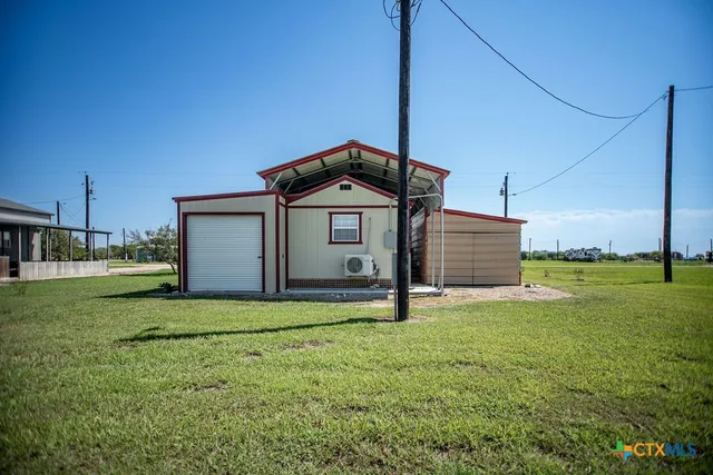 a house view with a garden space