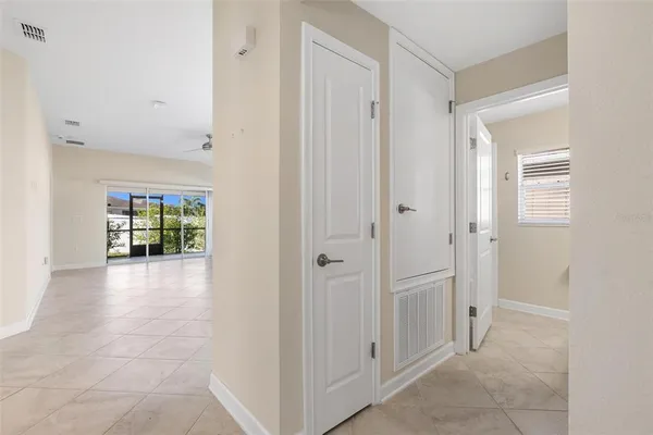 a view of an empty room with a window