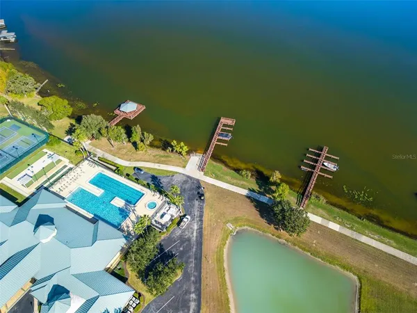 a kitchen with granite countertop stainless steel appliances and wood cabinets