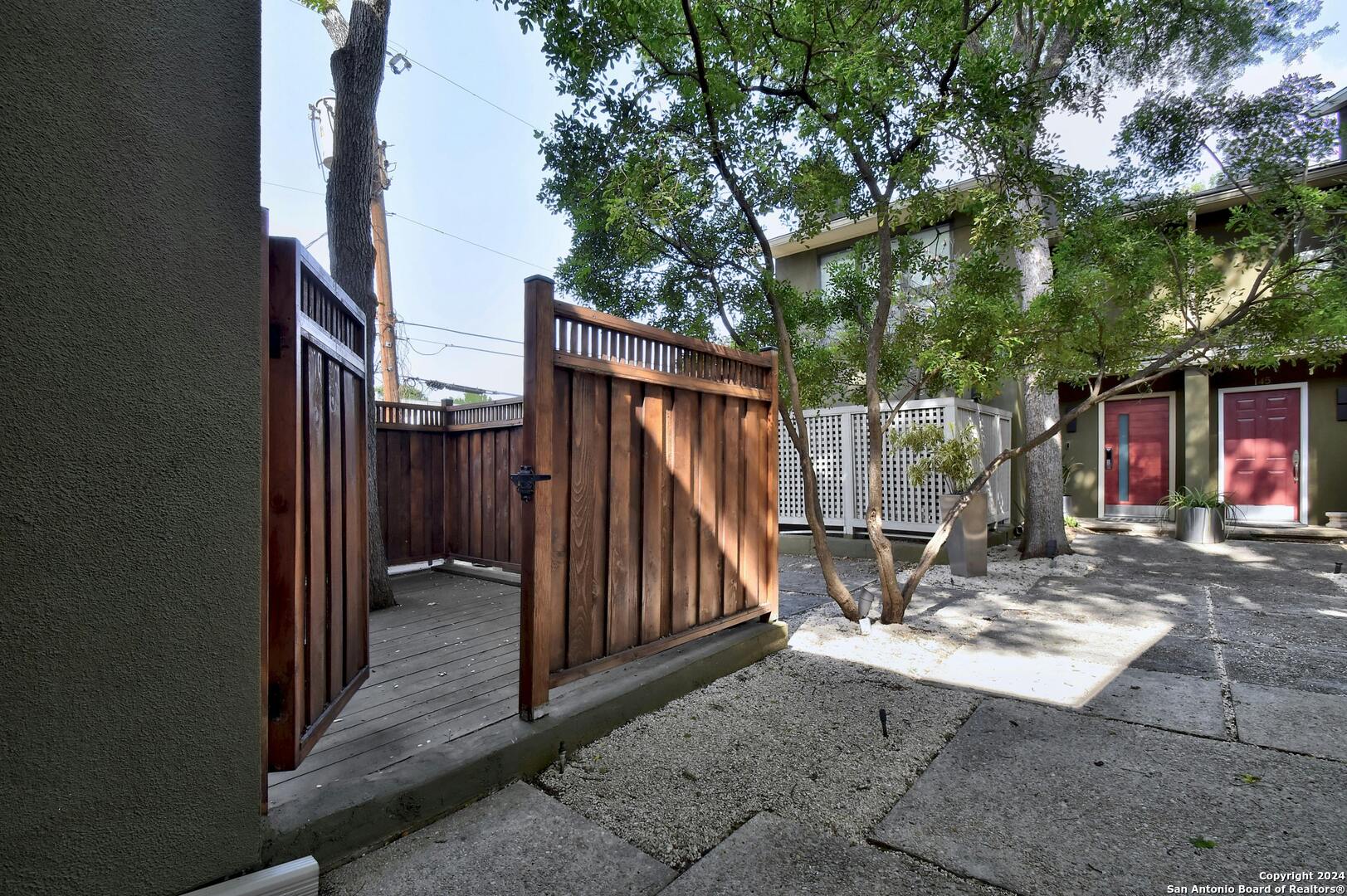 143 Terrell Road, Unit 1/2 San Antonio, TX 78209 - Photo 27 of 31 a view of outdoor space and deck