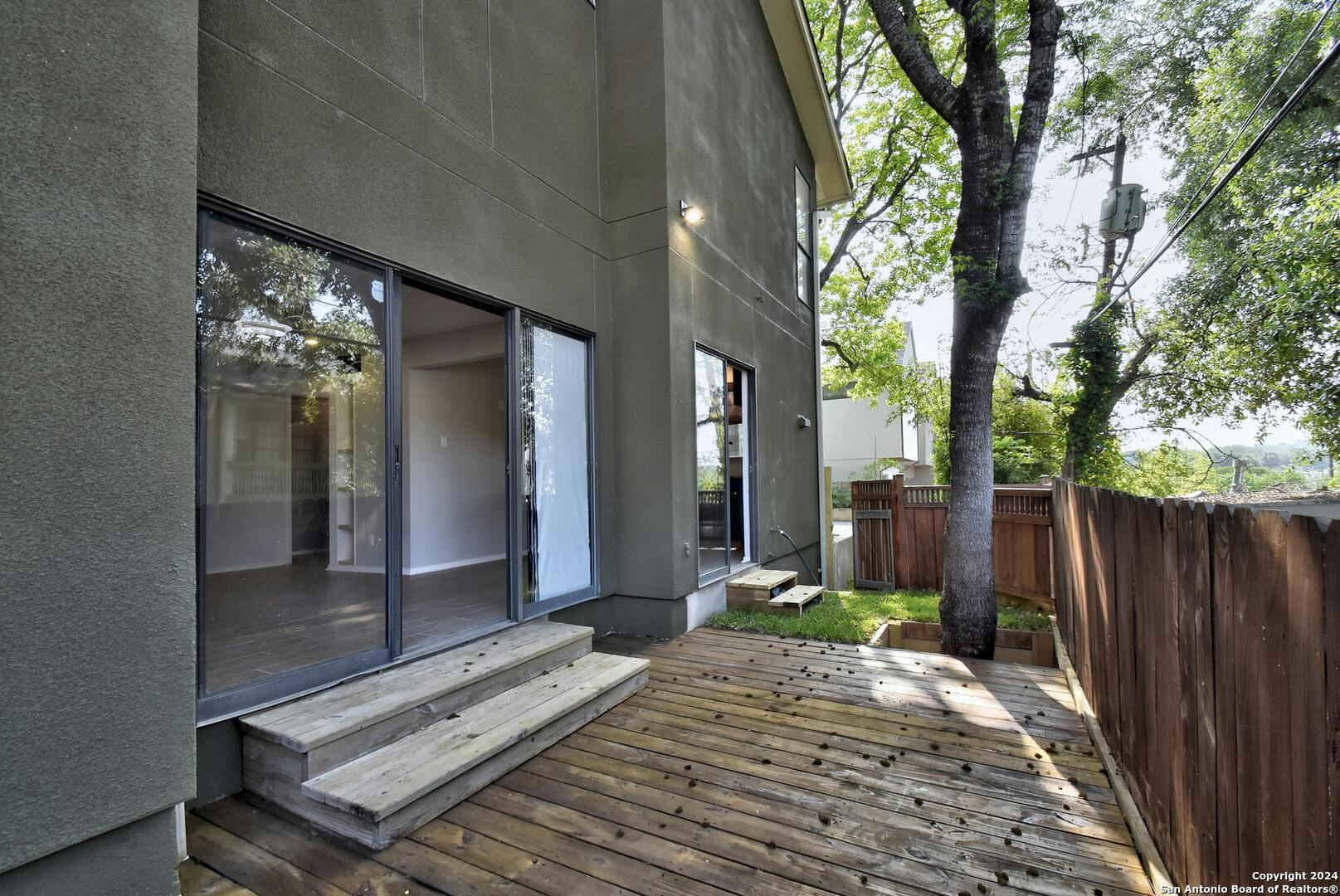 143 Terrell Road, Unit 1/2 San Antonio, TX 78209 - Photo 29 of 31 a view of a entryway door of the house