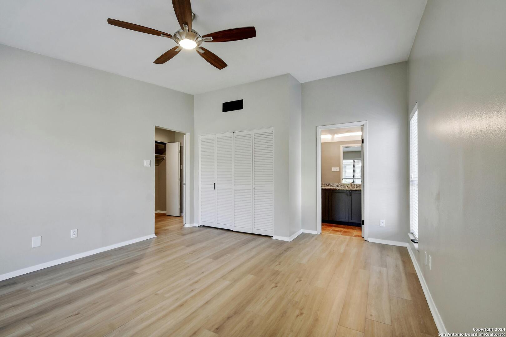 143 Terrell Road, Unit 1/2 San Antonio, TX 78209 - Photo 9 of 31 a view of empty room with wooden floor