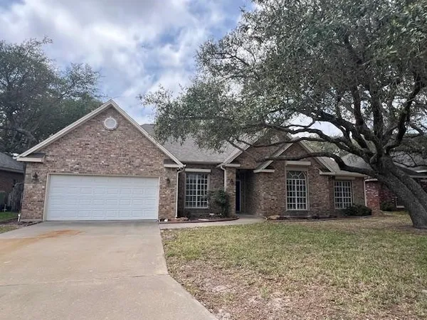 front view of a house with a dry yard
