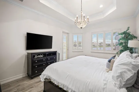 a bathroom with a shower sink vanity granite and shower