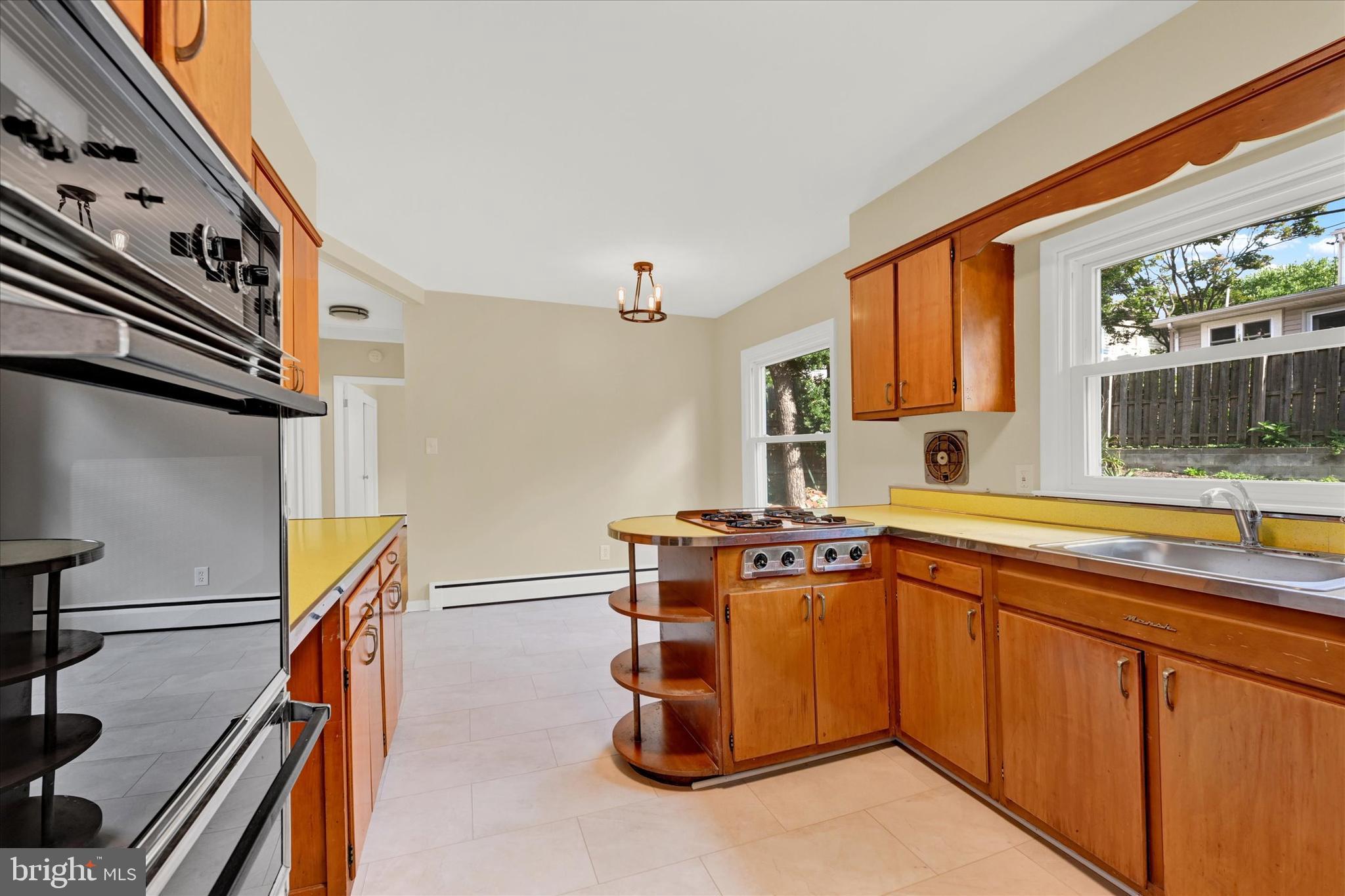 1028 St Albans Road Baltimore, MD 21239 - Photo 14 of 24 Sunny kitchen and dining area