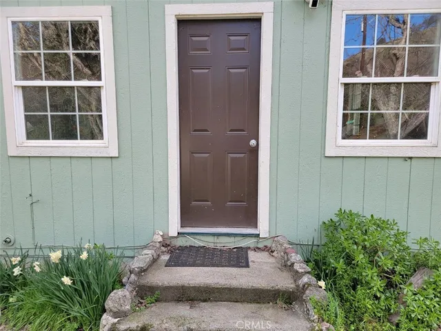 a front view of a house with a entryway