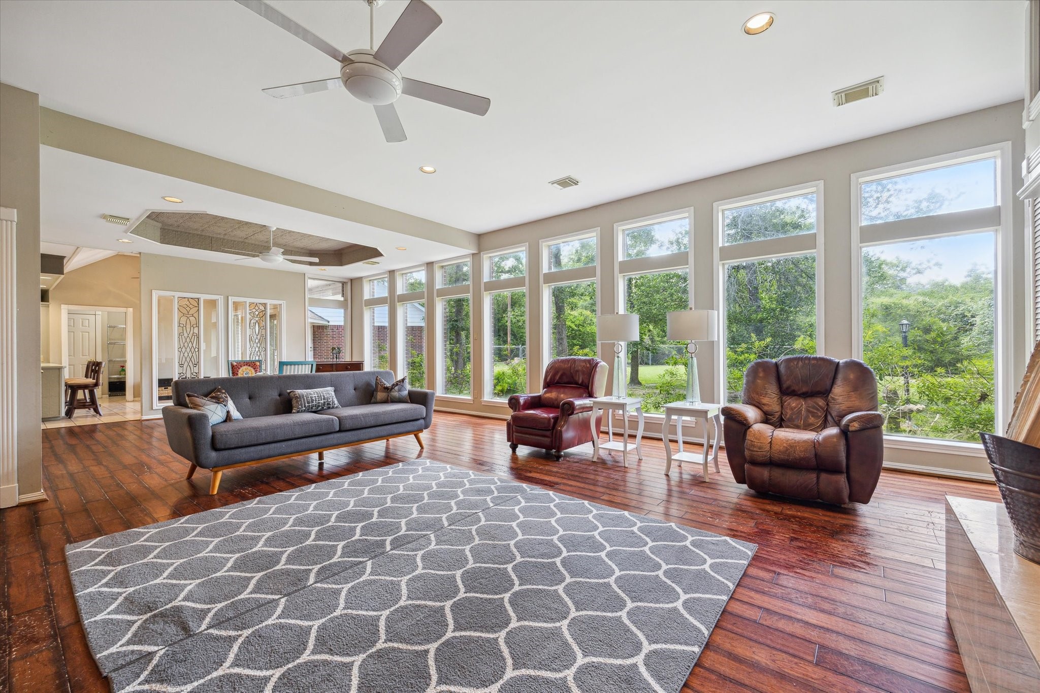 491 Oak Forest Road Bellville, TX 77418 - Photo 12 of 33 a living room with furniture and a large window