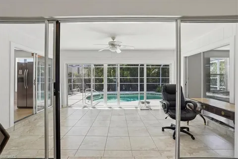 a view of a entryway door with couch