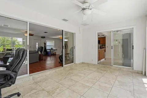 a view of a livingroom with furniture and entryway