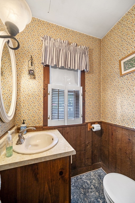 3 Trask Street Danvers, MA 01923 - Photo 18 of 29 a bathroom with a sink toilet and a mirror