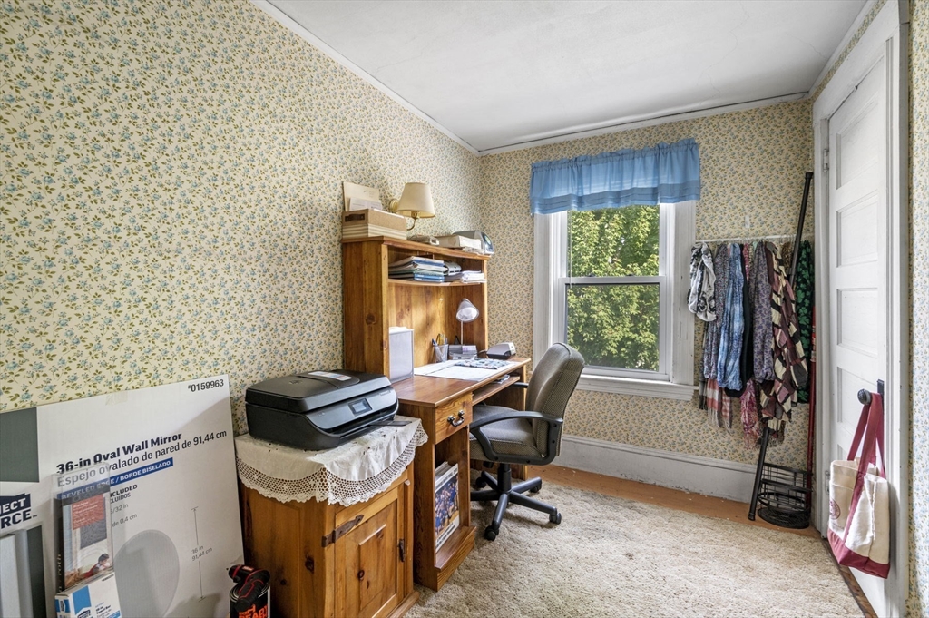 3 Trask Street Danvers, MA 01923 - Photo 19 of 29 a view of a workspace with furniture and a window