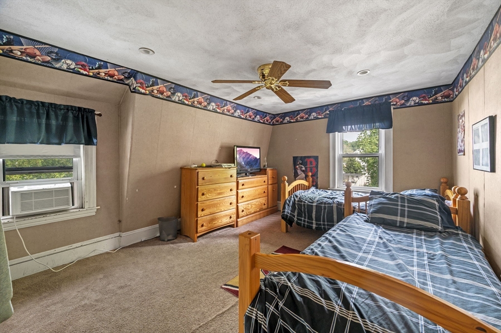 3 Trask Street Danvers, MA 01923 - Photo 20 of 29 a bedroom with furniture and window