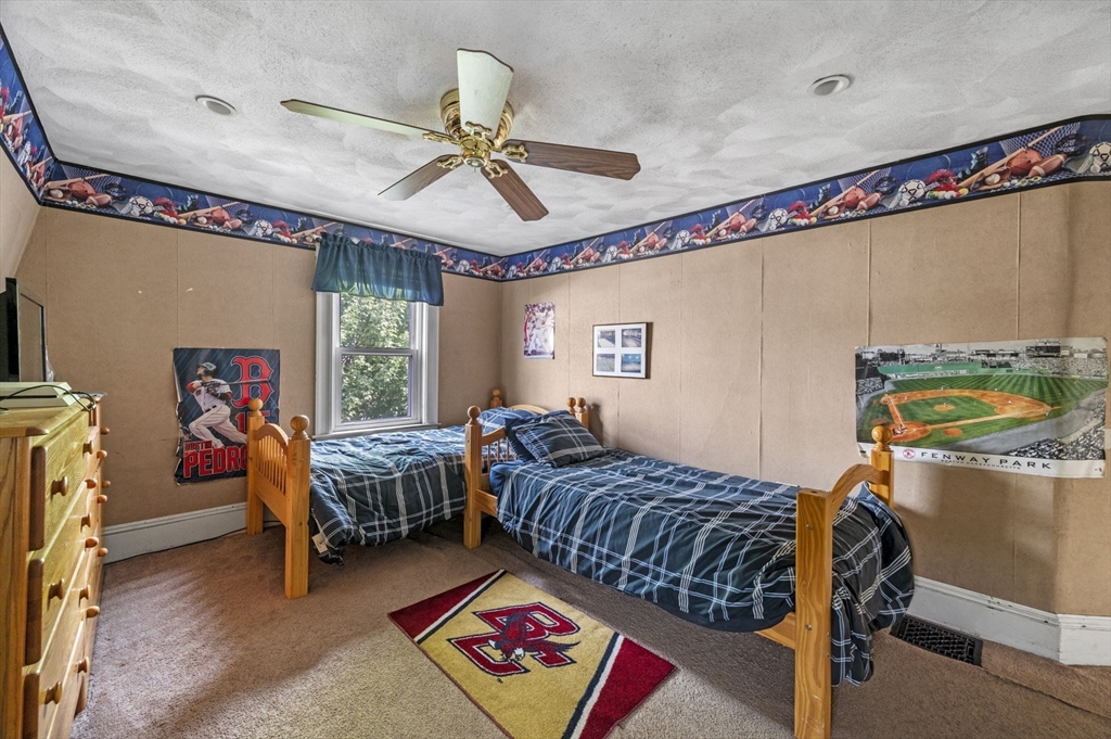 3 Trask Street Danvers, MA 01923 - Photo 21 of 29 a bedroom with bed and windows