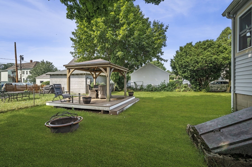 3 Trask Street Danvers, MA 01923 - Photo 10 of 29 a front view of a house with swimming pool garden and patio
