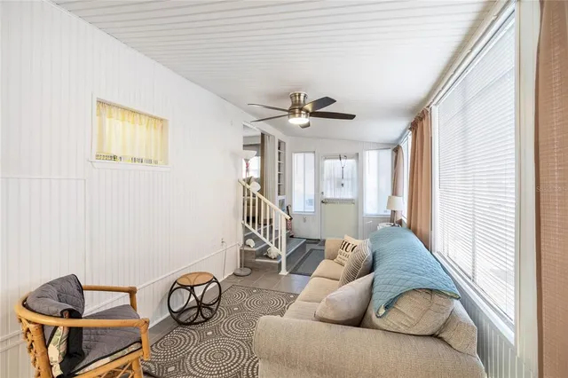 a view of a patio with a table and chairs