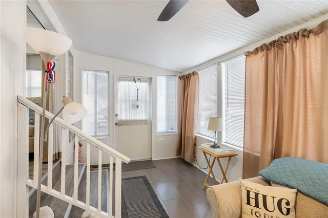 a view of a chair and tables