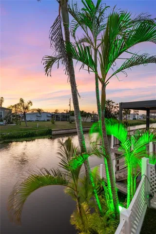 a view of a house with a small yard