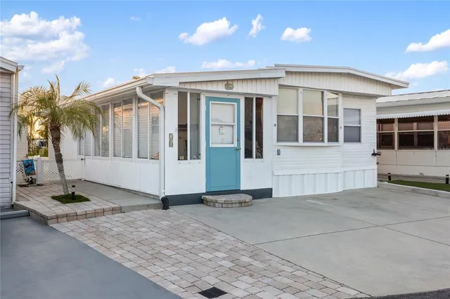 an aerial view of a house with a garden
