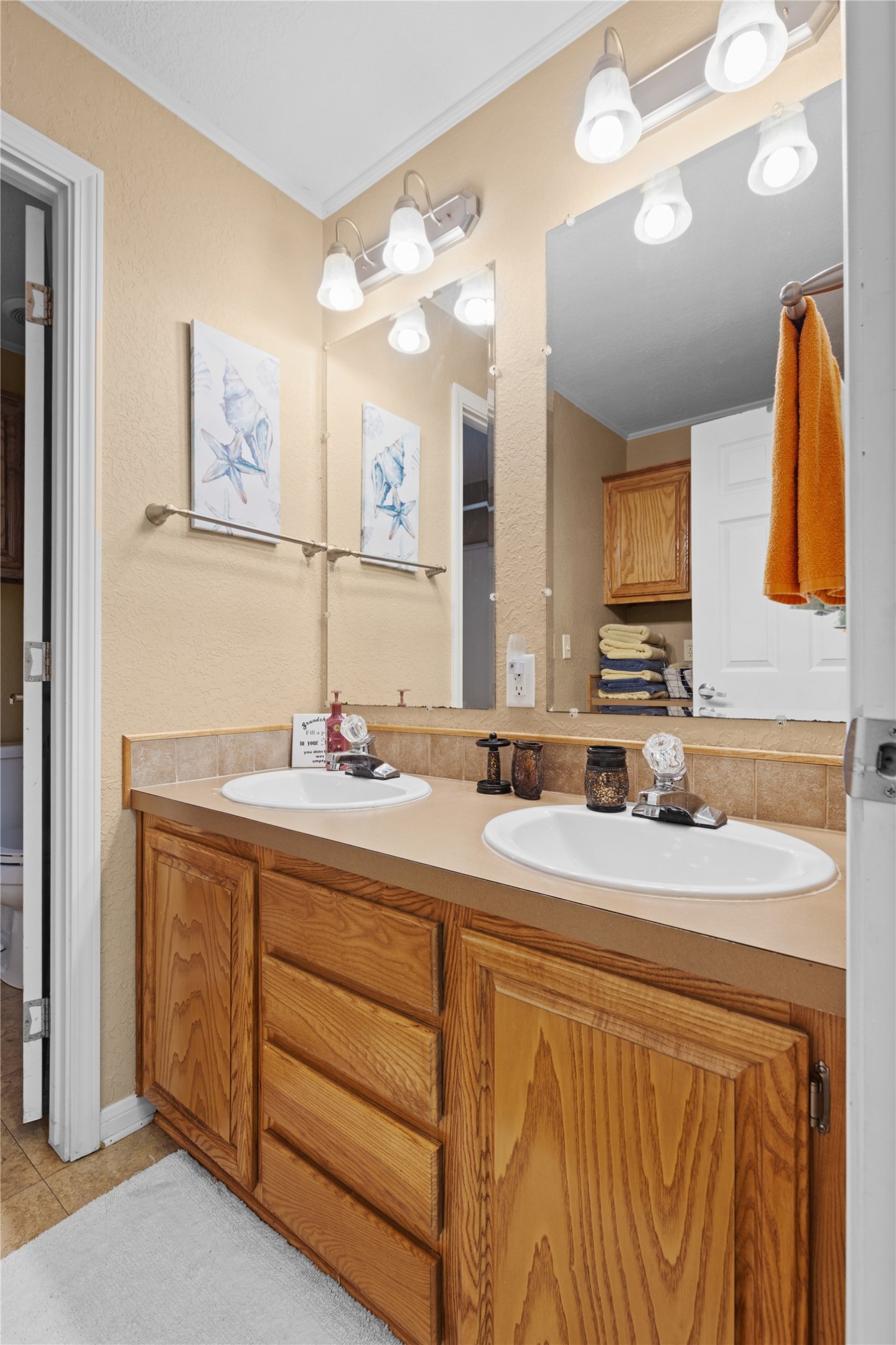 174 Lake Front Drive Trinity, TX 75862 - Photo 22 of 44 a bathroom with a double vanity sink mirror and double