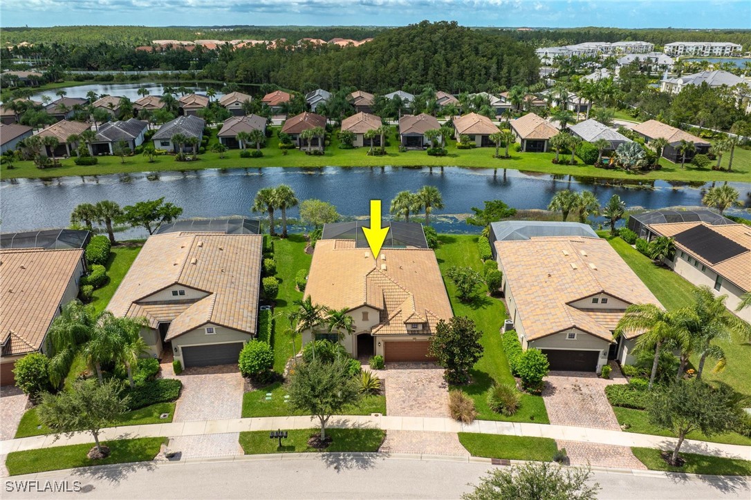 10813 Dennington Road Fort Myers, FL 33913 - Photo 33 of 42 an aerial view of a house with a lake view
