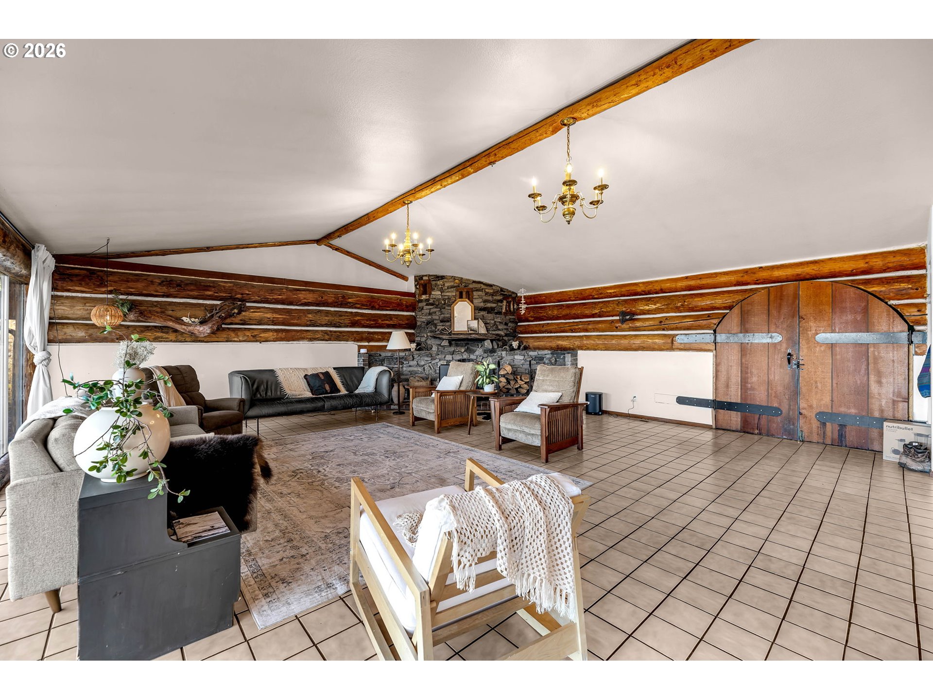 39904 Northeast Rotschy Road Yacolt, WA 98675 - Photo 9 of 48 a living room with patio furniture and a wooden floor