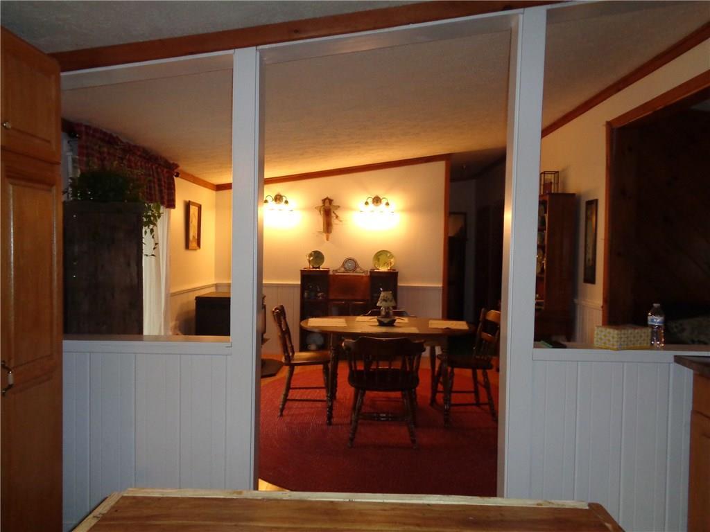 148 Line Road Corinna, ME 04928 - Photo 8 of 18 View from kitchen to formal dining room.