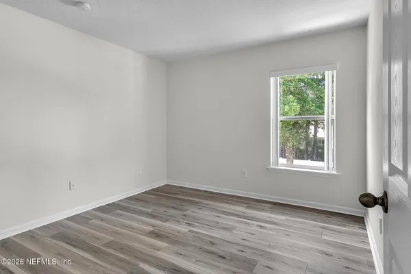 a view of a room that has a window in it