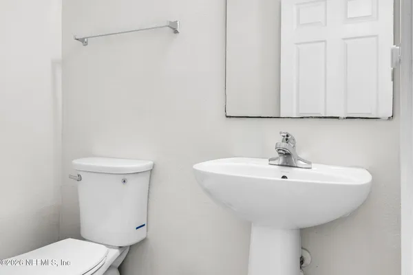 a bathroom with a sink and a toilet