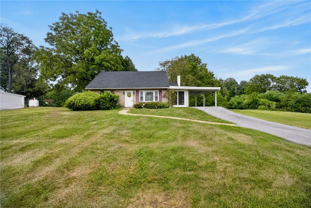 3123 Orefield Road Allentown, PA 18104 - Photo 2 of 39 A charming single-story home with a spacious lawn and a convenient carport awaits its new owner.